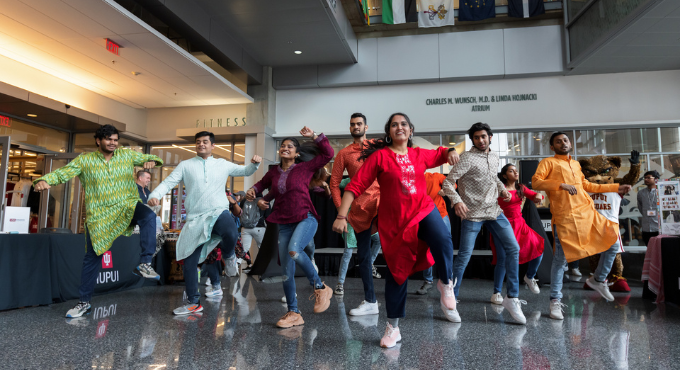 Students in DesiJags perform a cultural dance at the 2023 International Festival